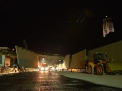 Asphalting the tunnel from the Taranaki Street portal. Image: NZTA.
