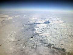 Sea ice viewed from the window of a C17 aircraft from a height of 9500m. Sea ice is formed on the ocean surface when the water temperature falls to -2°C. Image: LEARNZ.