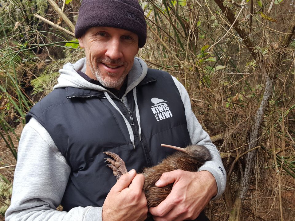 It's hard not to smile when you're holding one of these special birds. Image: LEARNZ.