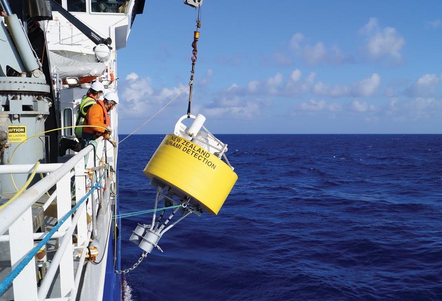 A DART buoy being deployed from Tangaroa, the NIWA research boat. Image: NIWA.