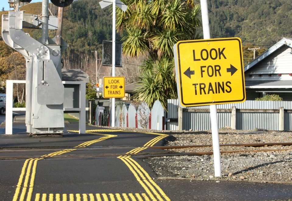 Take notice of the signs, lights, and bells at level crossings. Image: supplied.