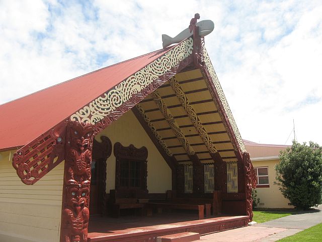 You may recognise this whare tipuna at Whangara from the movie Whale Rider. You can see how paua shell has been used to decorate its carvings. Image: LEARNZ