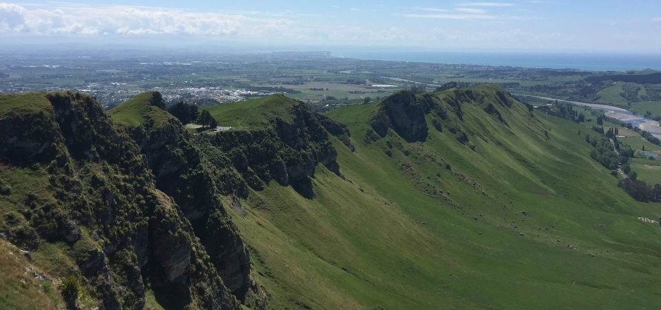Places were often named after people. Te Mata Peak and adjacent hills are believed to be the final resting place of Rongokako, grandfather of Kahungunu (founder of the Ngāti Kahungunu tribe). Called Te Mata-o-Rongokako (the face of Rongokako), from a side view of the hills it looks like he is lying down. Image: LEARNZ.